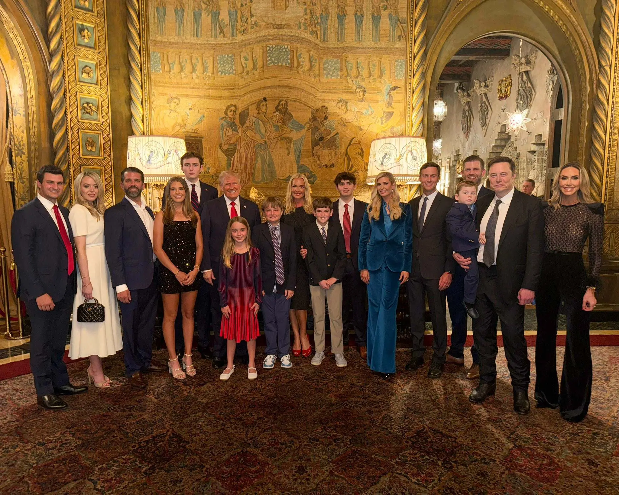 Trump's granddaughter shares a "victory family photo," with Musk appearing in the frame